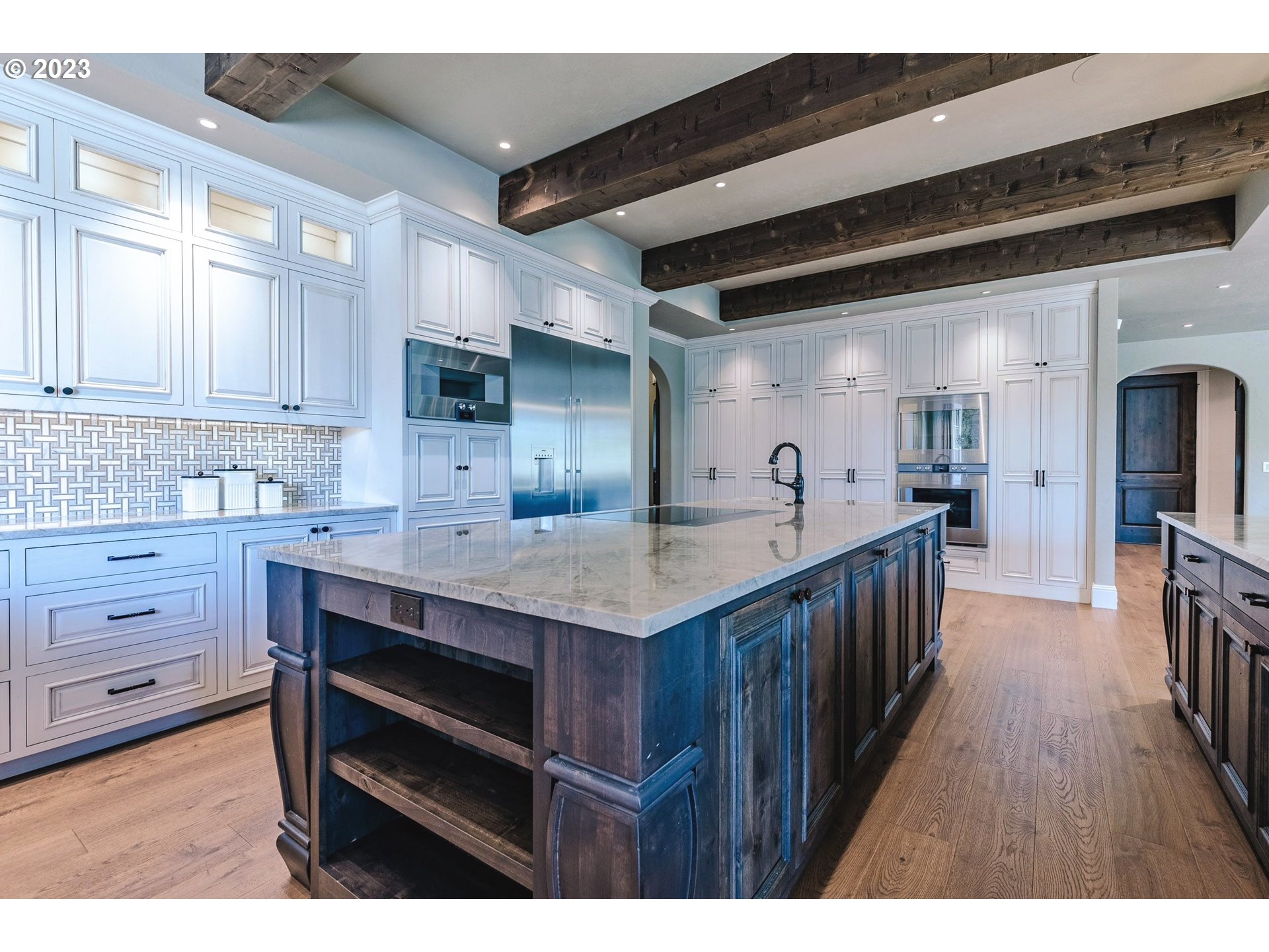 4075 Gilham Road Eugene, OR 97408 - Photo 15 of 48 a kitchen with a stove a refrigerator and a cabinets