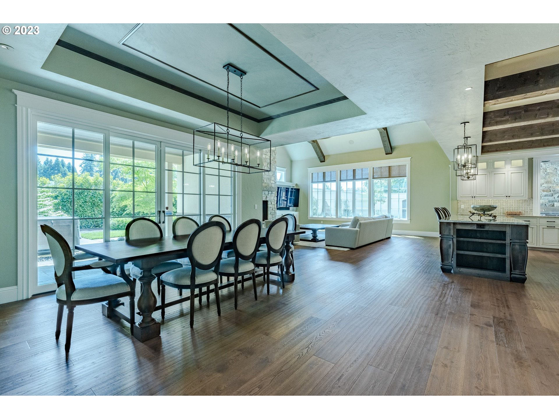4075 Gilham Road Eugene, OR 97408 - Photo 16 of 48 a open dining room with furniture and wooden floor