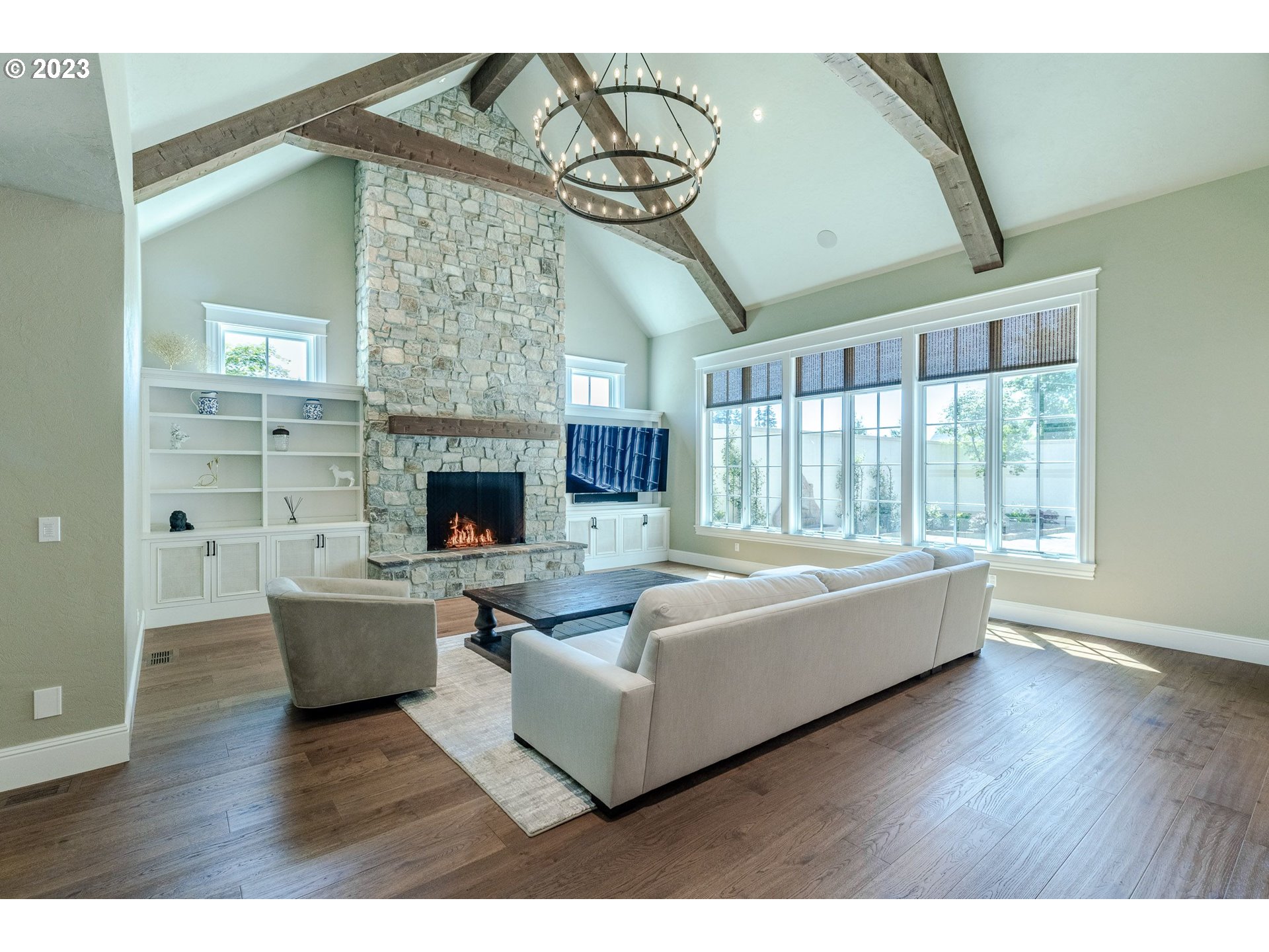 4075 Gilham Road Eugene, OR 97408 - Photo 19 of 48 a living room with furniture and a fireplace