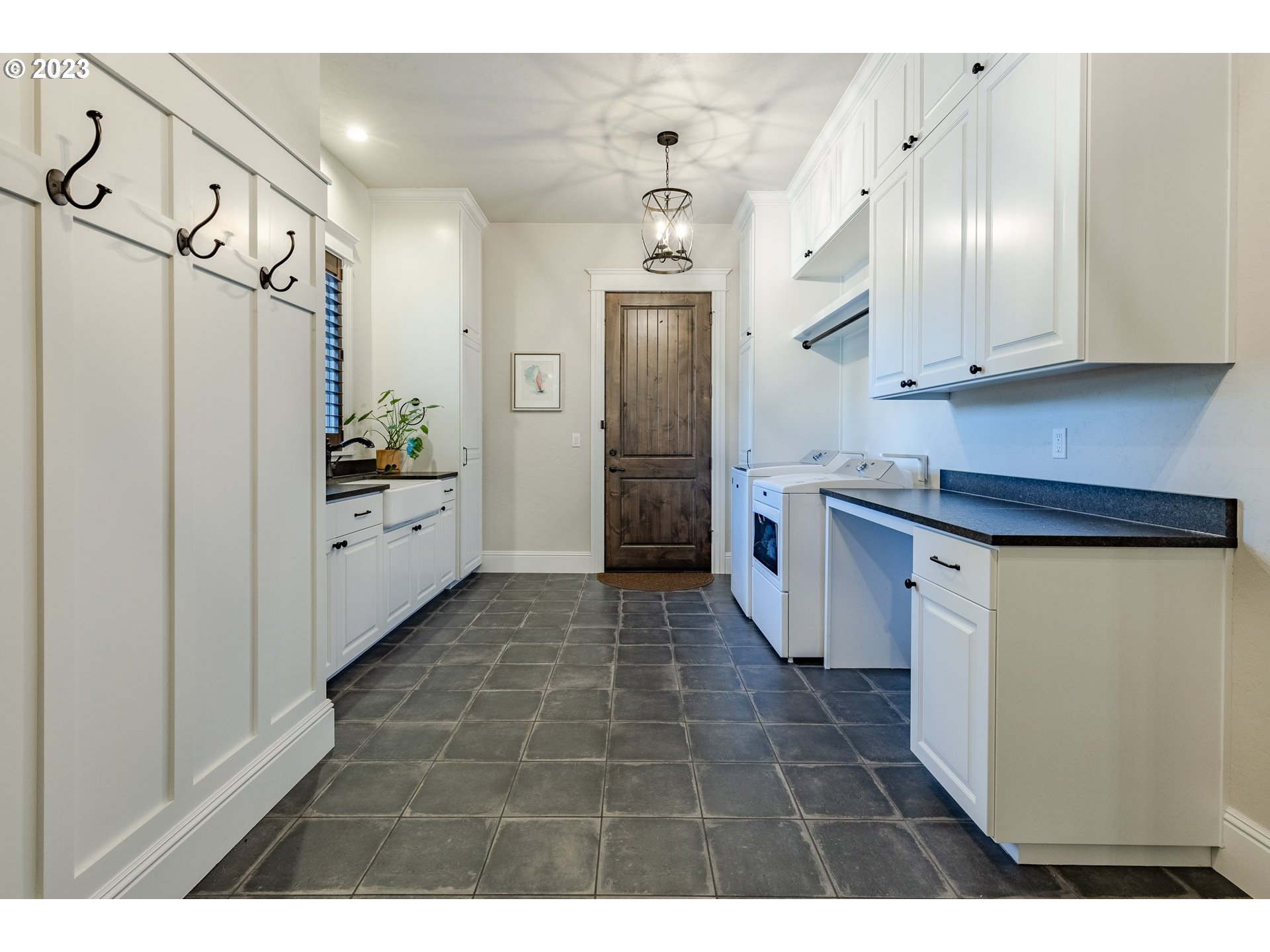 4075 Gilham Road Eugene, OR 97408 - Photo 23 of 48 a kitchen with stainless steel appliances granite countertop a refrigerator and a sink