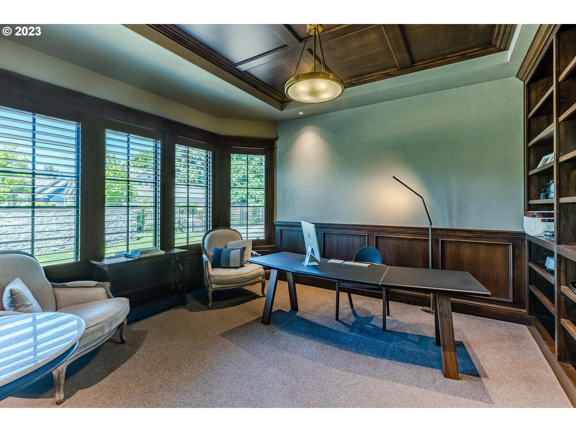 4075 Gilham Road Eugene, OR 97408 - Photo 24 of 48 a living room with furniture and a wooden floor
