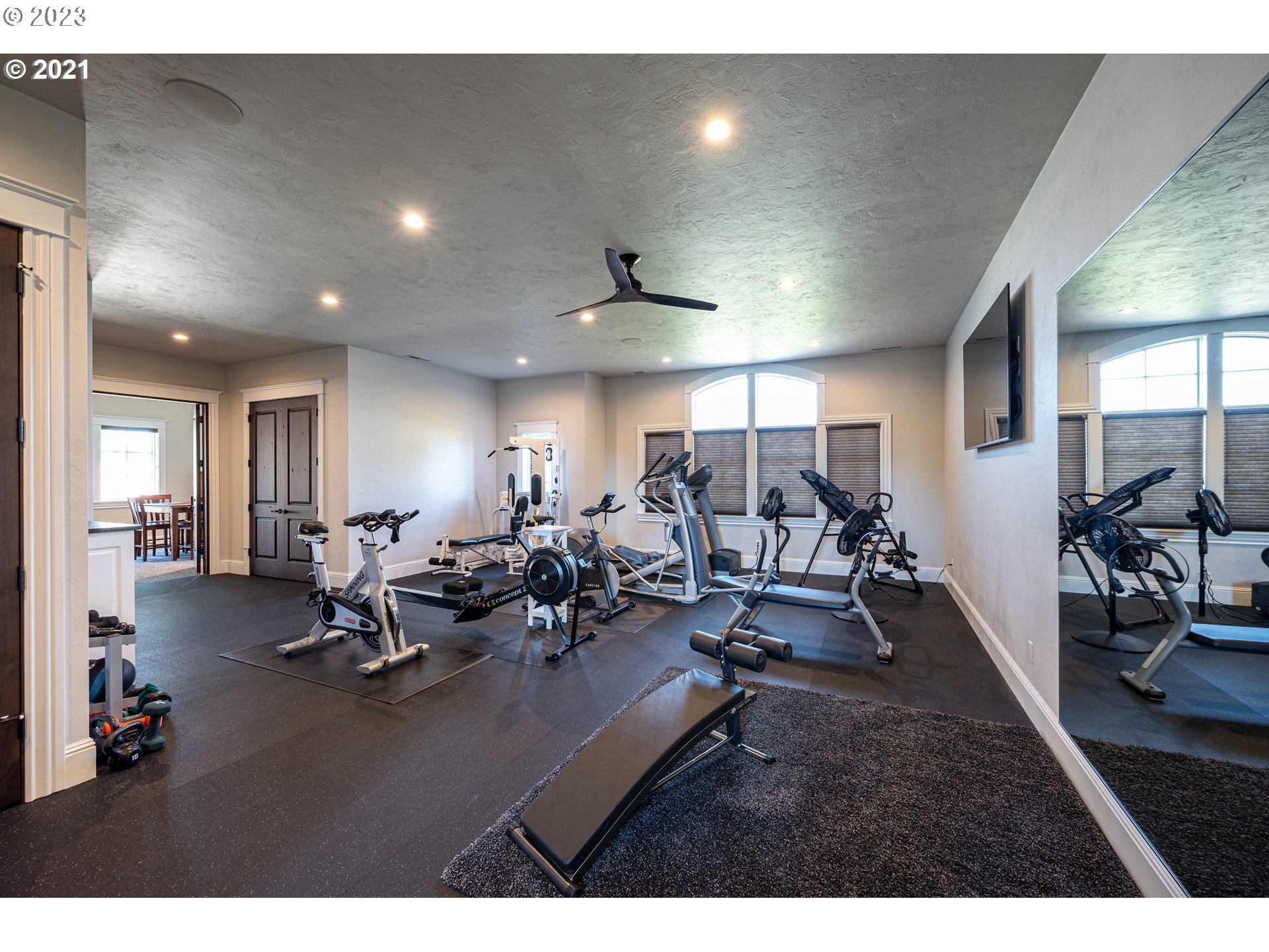 4075 Gilham Road Eugene, OR 97408 - Photo 33 of 48 a living room with lots of furniture and a wooden floors