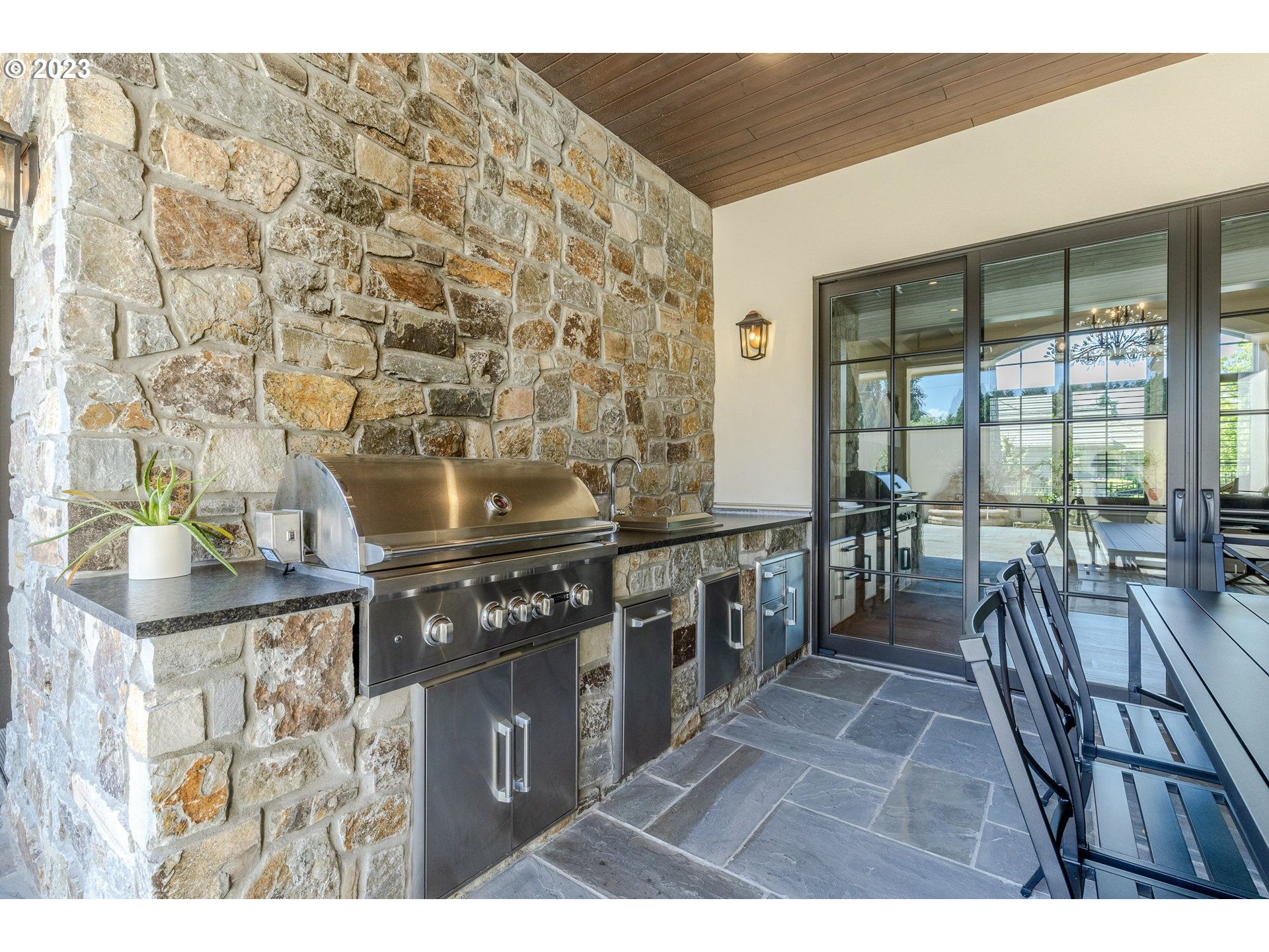 4075 Gilham Road Eugene, OR 97408 - Photo 36 of 48 a view of a chairs and table in a patio