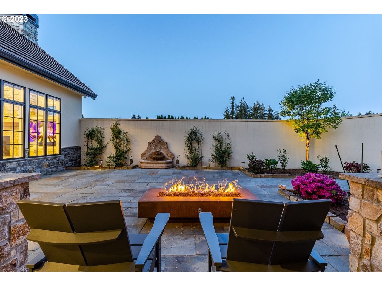 4075 Gilham Road Eugene, OR 97408 - Photo 46 of 48 a view of a dining room with furniture and a potted plant