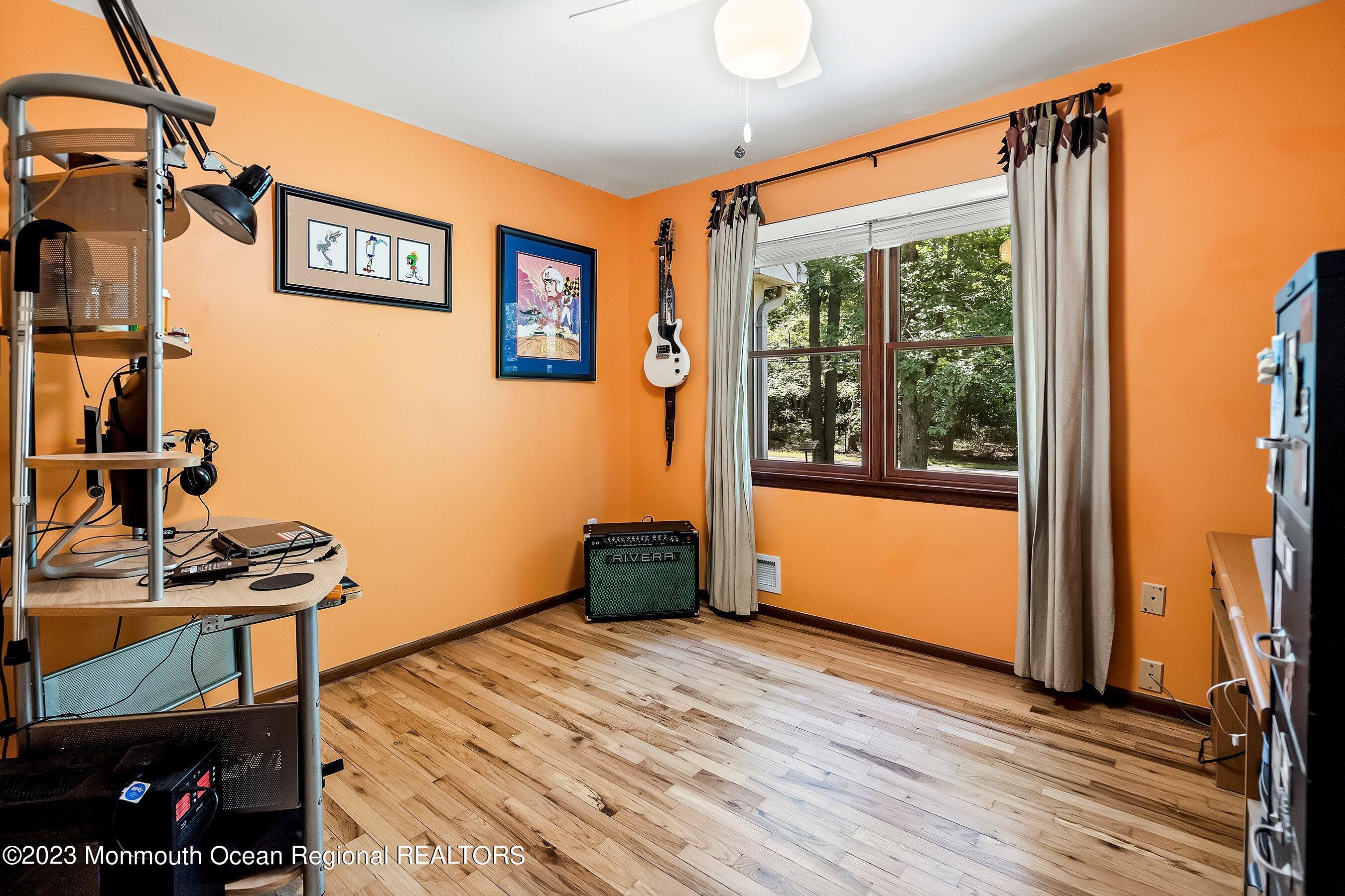 146 Peskin Road Farmingdale, NJ 07727 - Photo 16 of 31 a view of a room with wooden floor and furniture