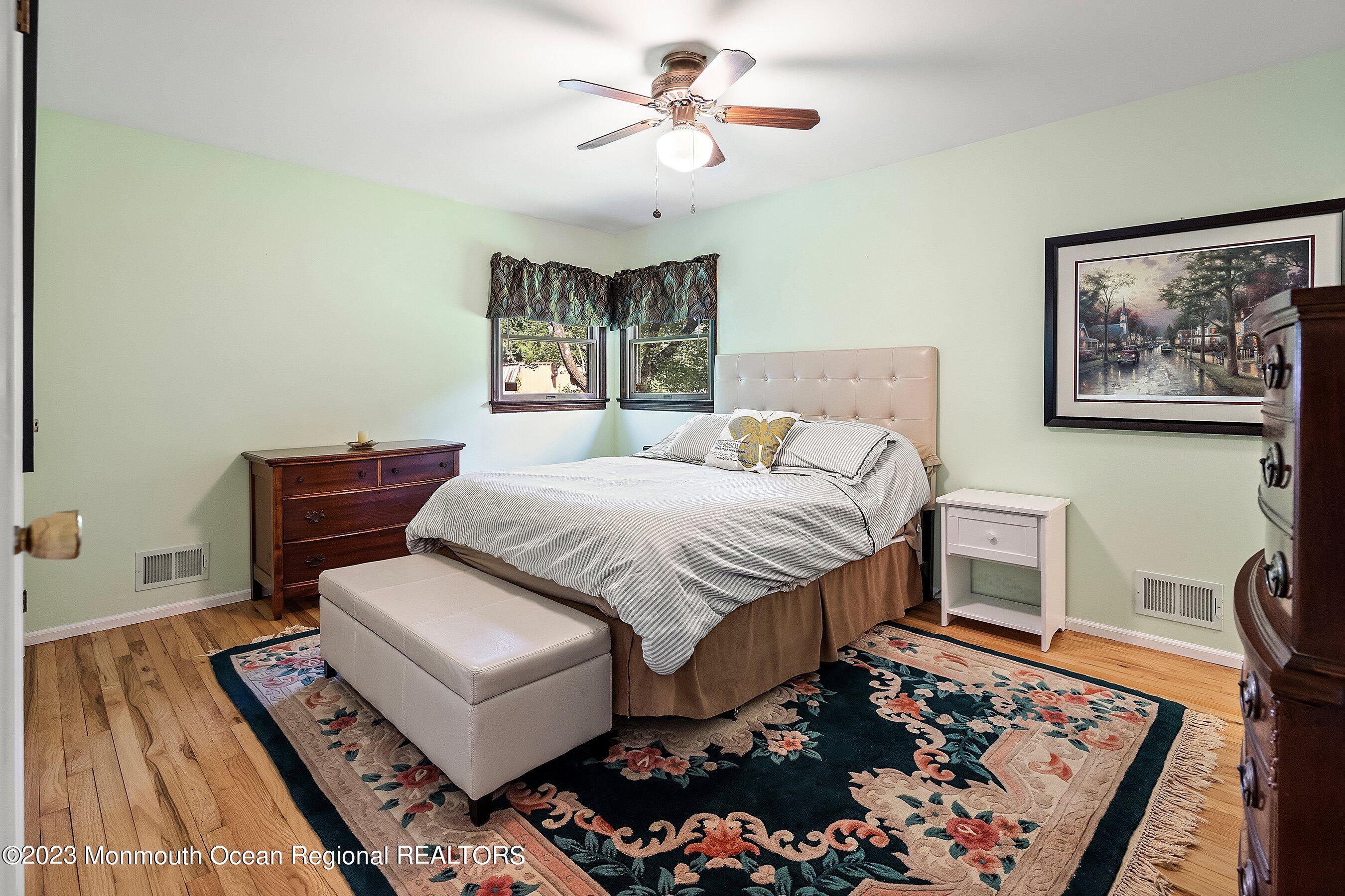 146 Peskin Road Farmingdale, NJ 07727 - Photo 18 of 31 a bedroom with furniture and a rug