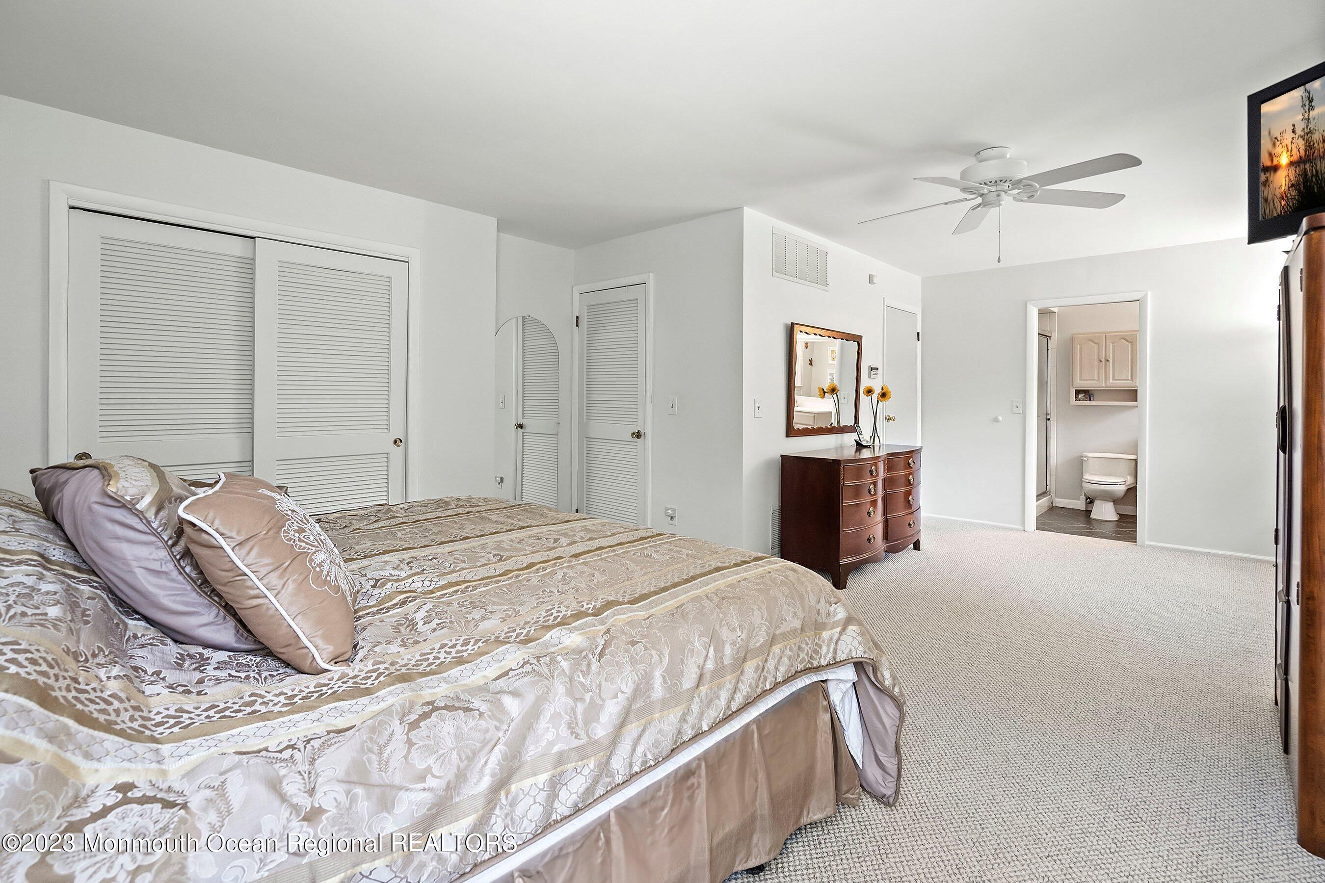 146 Peskin Road Farmingdale, NJ 07727 - Photo 21 of 31 a bedroom with a bed and a dresser