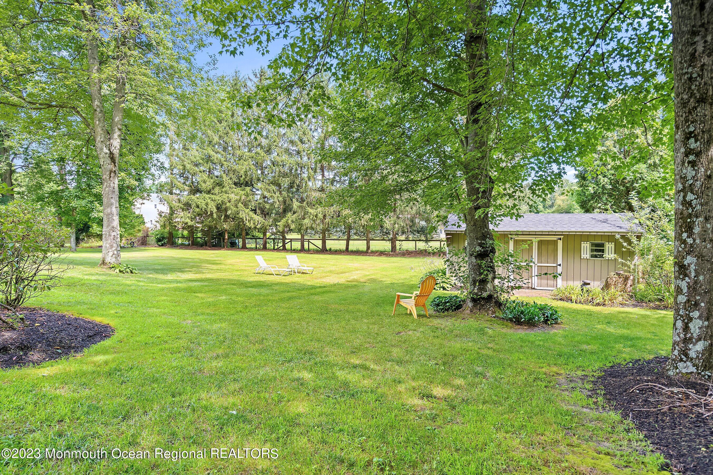 146 Peskin Road Farmingdale, NJ 07727 - Photo 26 of 31 a view of a house with a yard