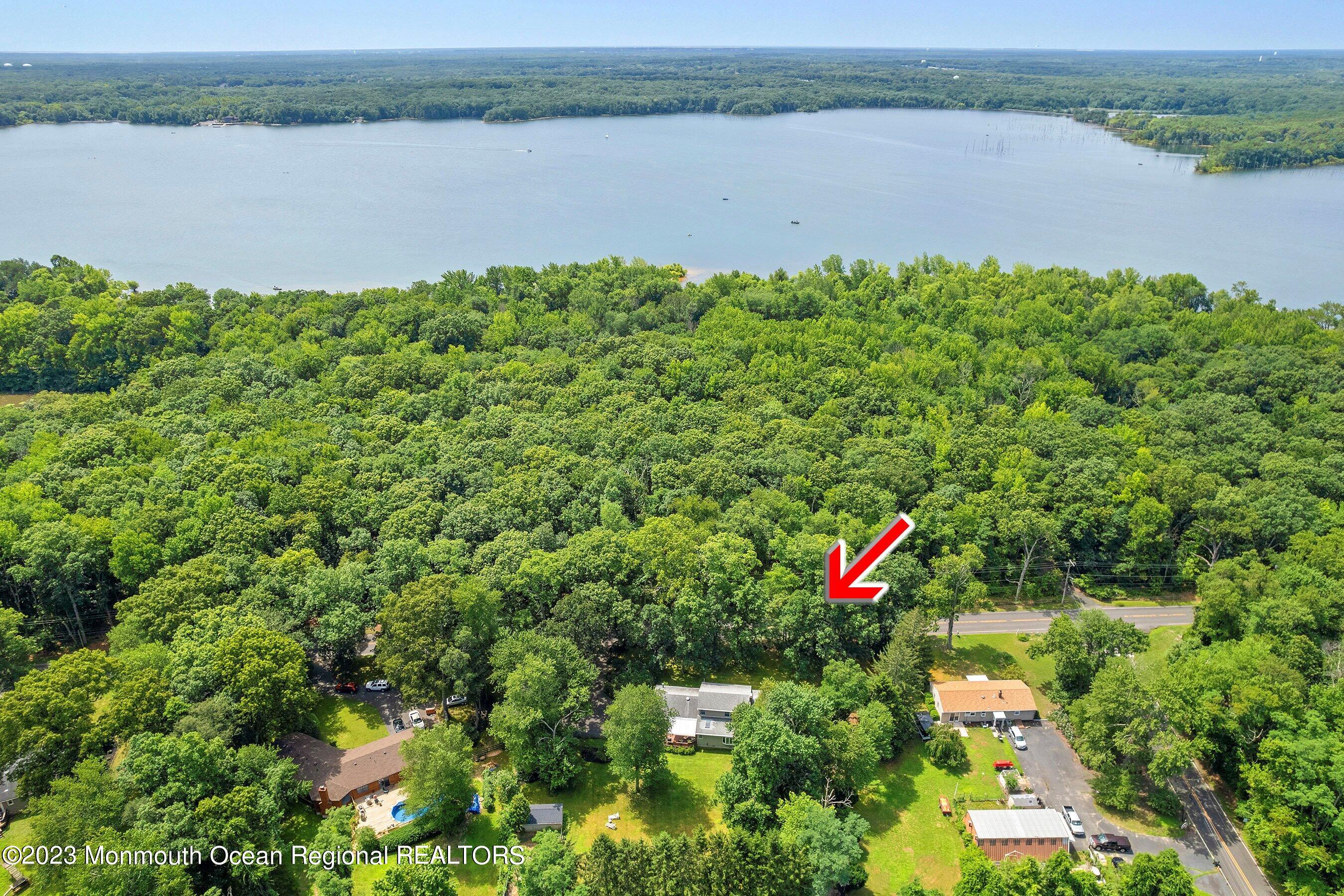 146 Peskin Road Farmingdale, NJ 07727 - Photo 30 of 31 a view of a lake from a yard