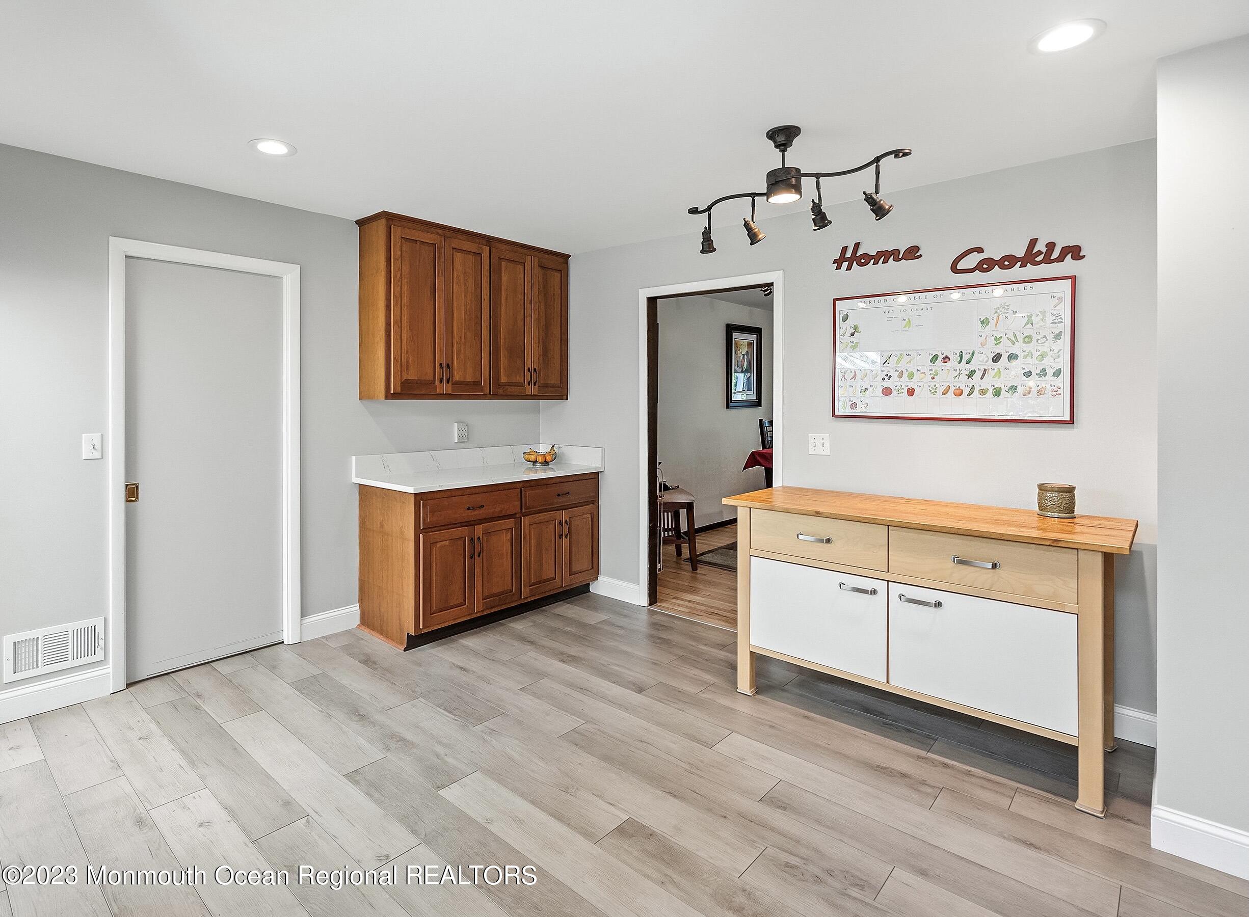 146 Peskin Road Farmingdale, NJ 07727 - Photo 31 of 31 a view of a room with cabinets and wooden floor
