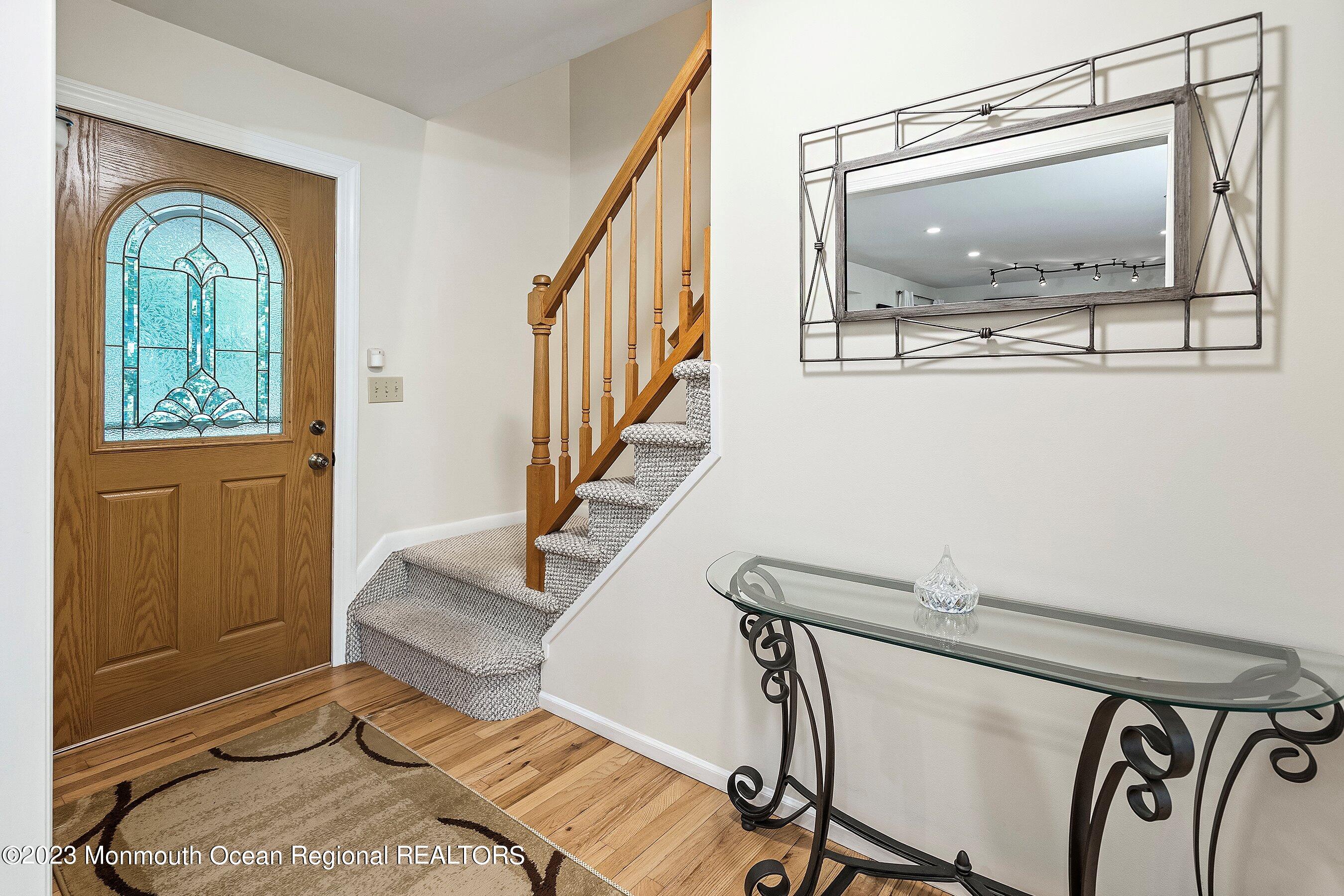 146 Peskin Road Farmingdale, NJ 07727 - Photo 5 of 31 a view of workspace with wooden floor and windows