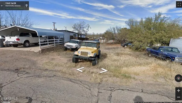 a car parked in front of a house