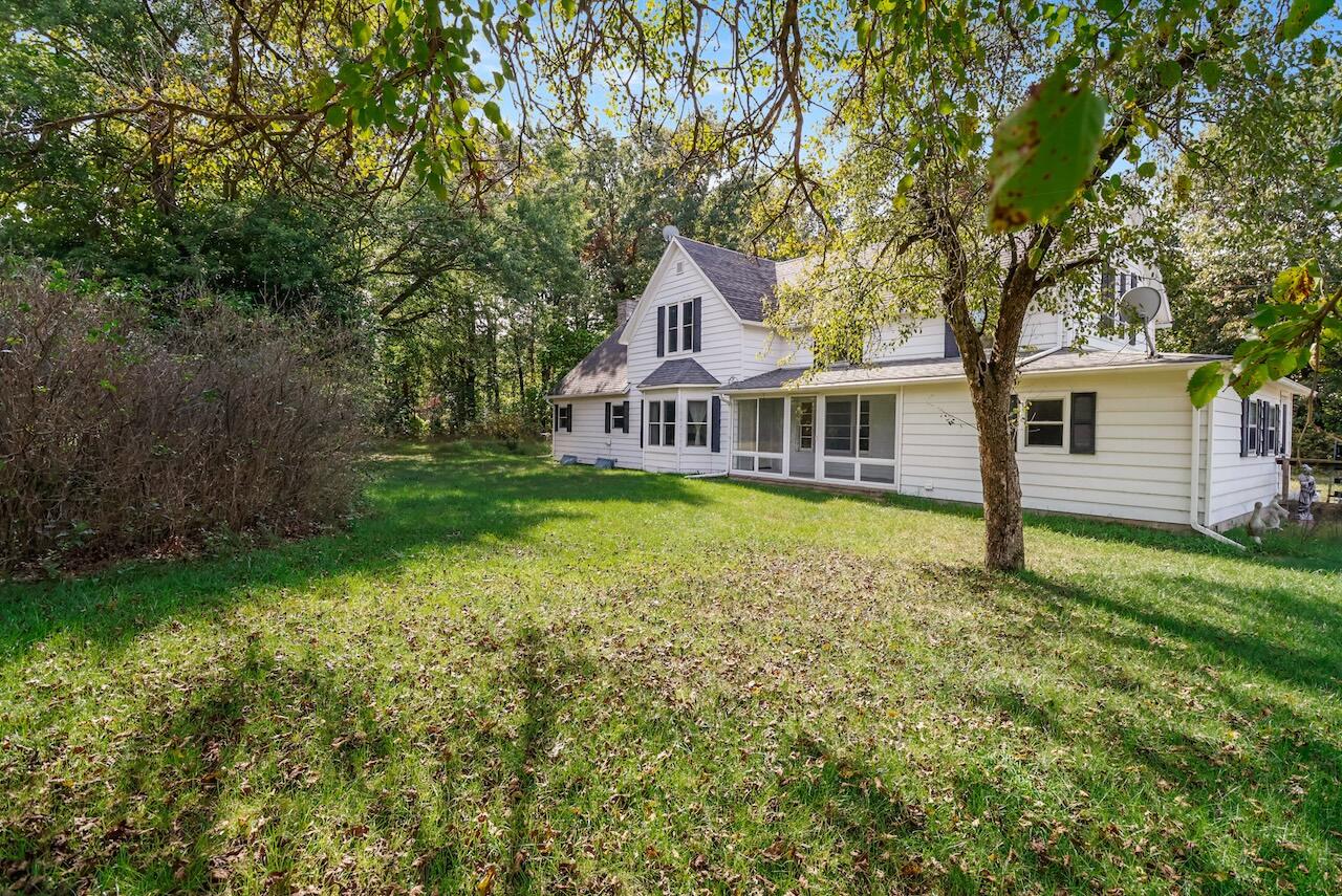 a house with garden in front of it