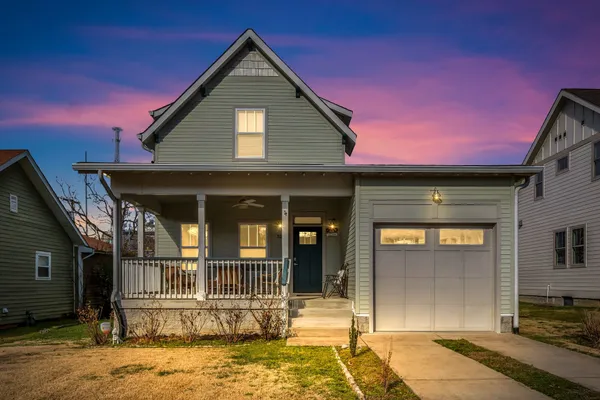 a front view of a house with a porch