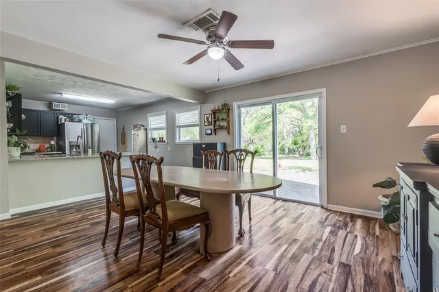 a kitchen with granite countertop a stove and a sink