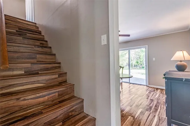 a workspace with furniture window and wooden floor