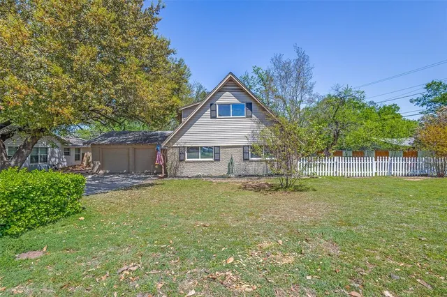 a house view with a garden space