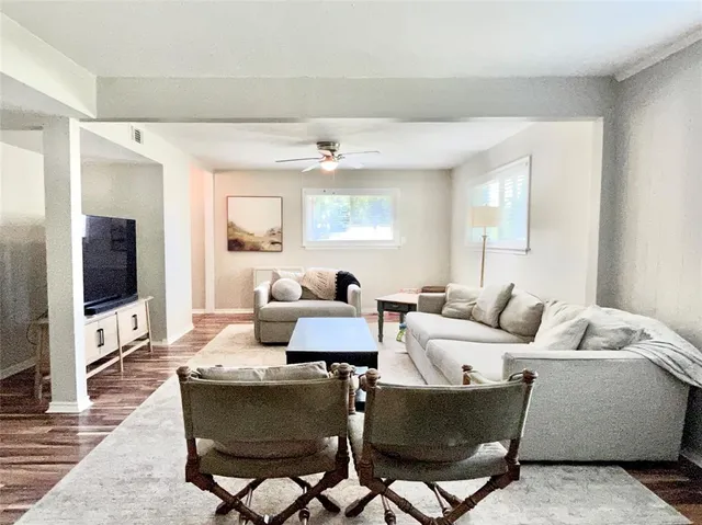 a view of a park with plants and trees