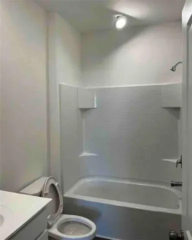 a bathroom with a sink and a bathtub