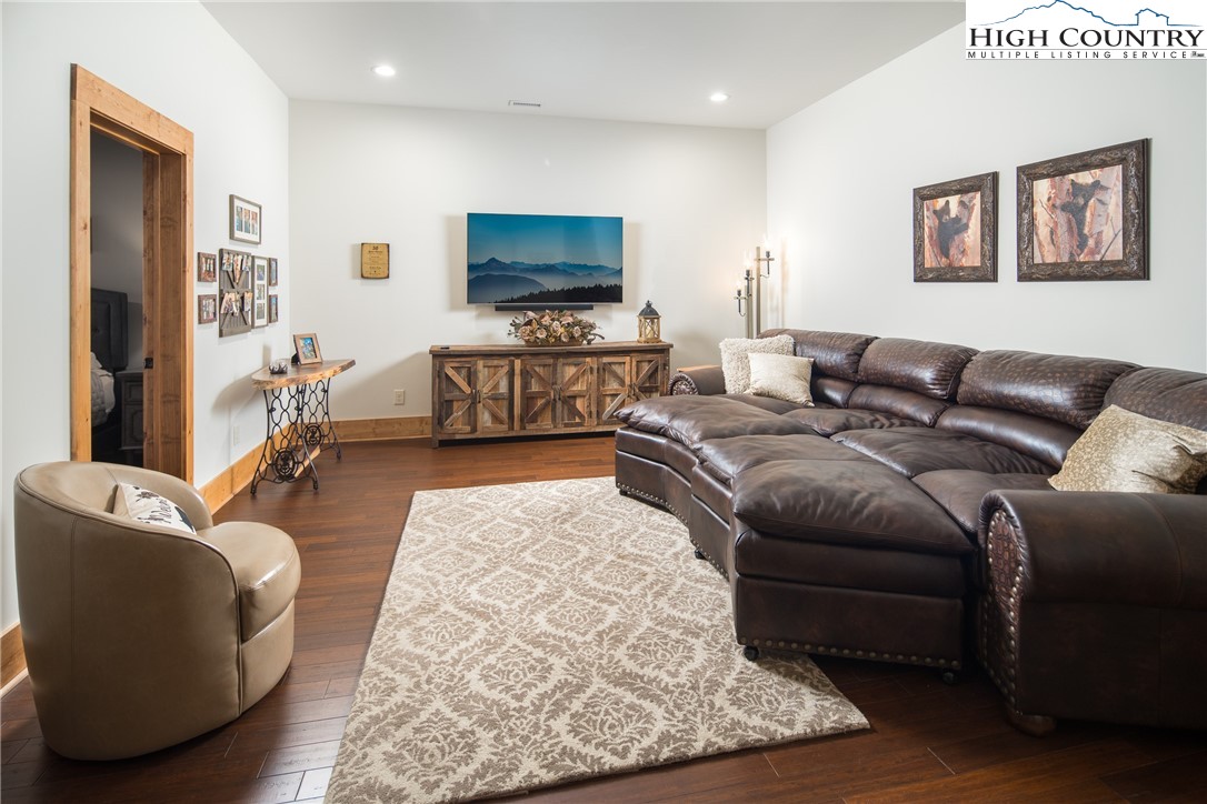 765 Pepperroot Road Boone, NC 28607 - Photo 20 of 35 a living room with furniture and a flat screen tv