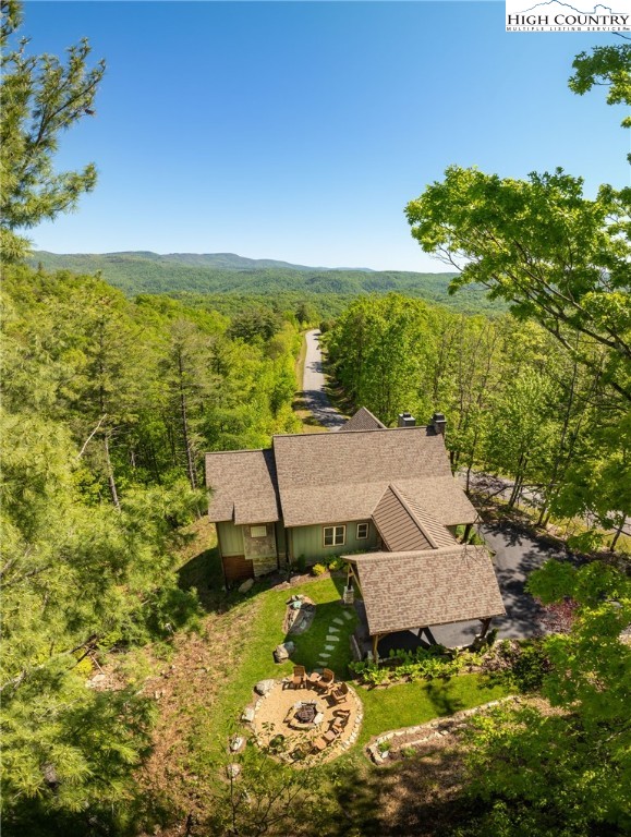 765 Pepperroot Road Boone, NC 28607 - Photo 34 of 35 an aerial view of a house with a garden