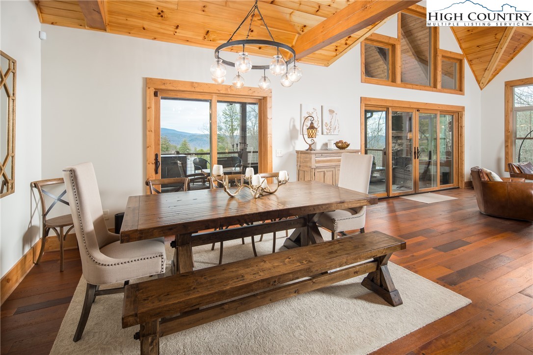 765 Pepperroot Road Boone, NC 28607 - Photo 10 of 35 a dining room with furniture and wooden floor