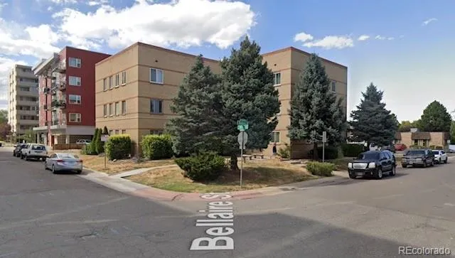 a view of a street with cars