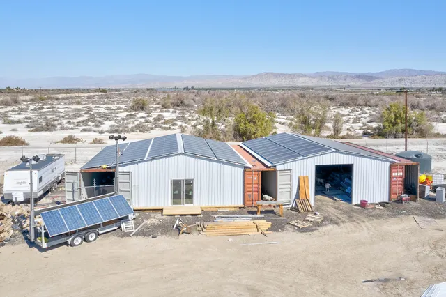 a view of ocean and mountain