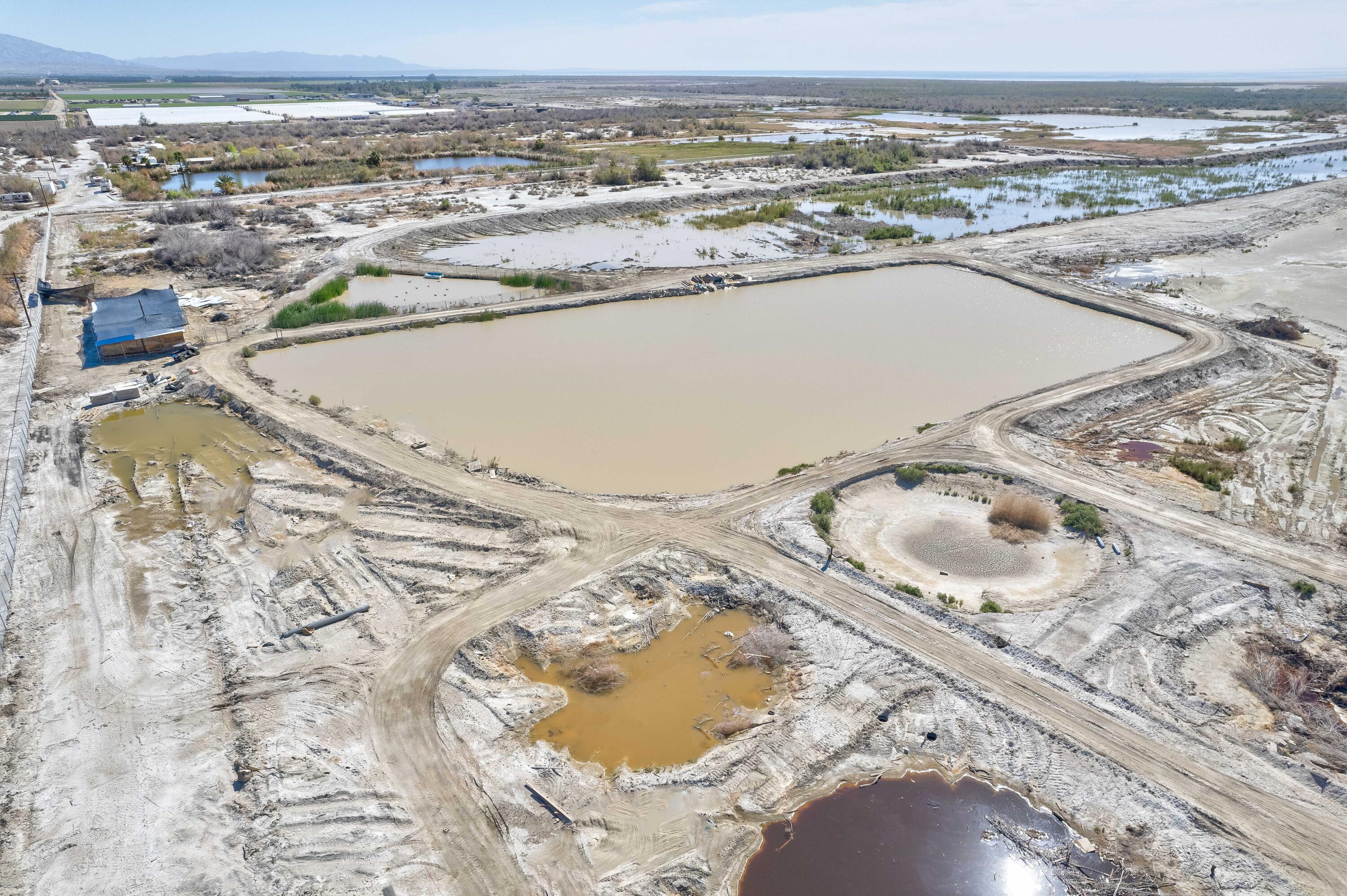 70140 Johnson Street Mecca, CA 92254 - Photo 29 of 29 an aerial view of residential houses with outdoor space