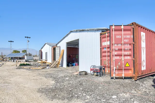 an aerial view of a house with a outdoor space