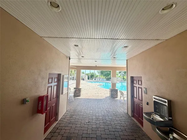 a hallway with a large window