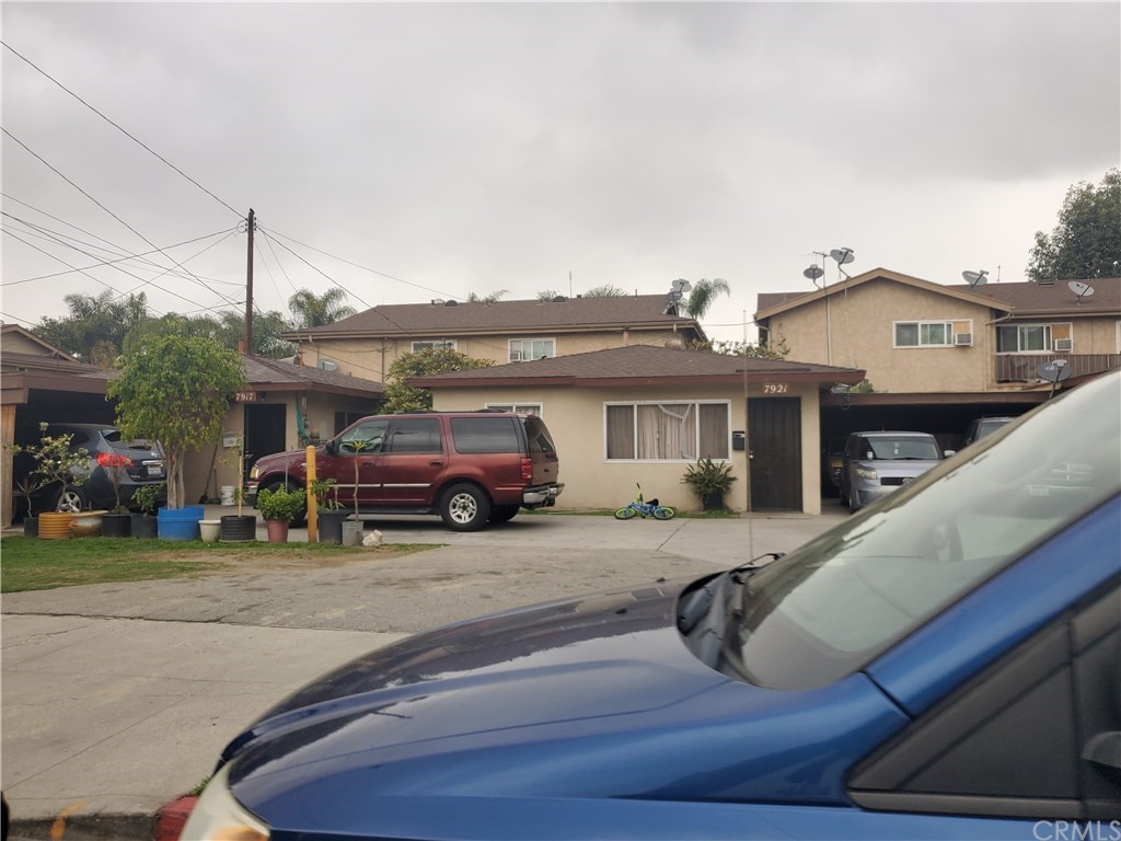 7913 Howe Street Paramount, CA 90723 - Photo 11 of 17 a view of a car park in front of house