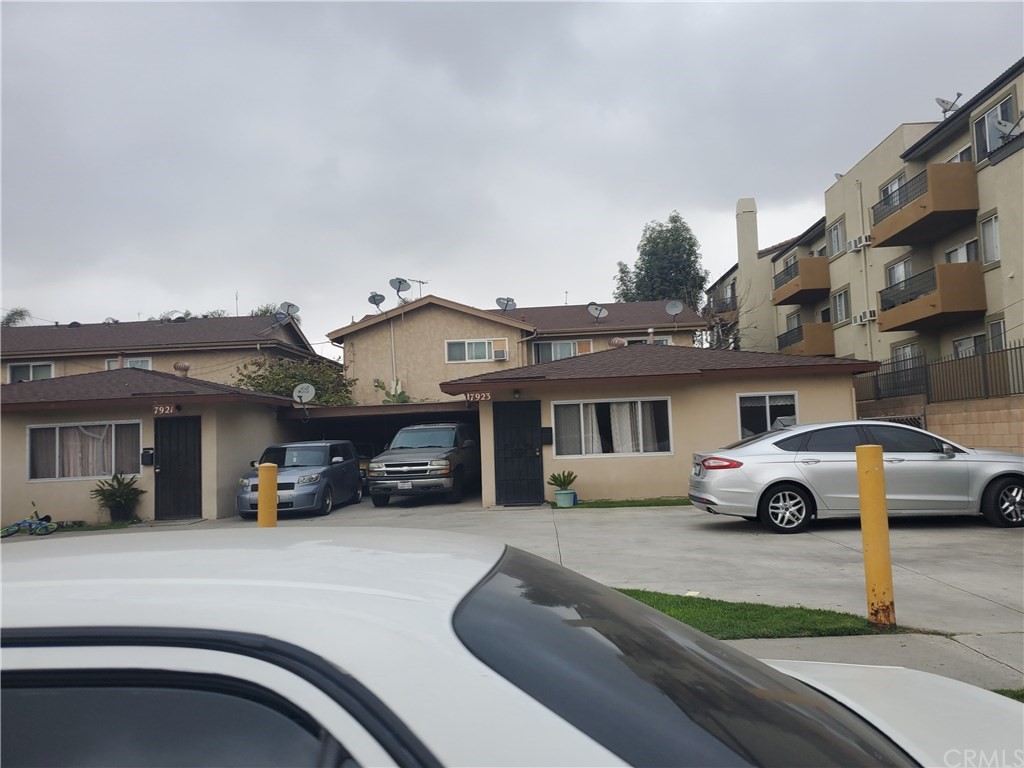 7913 Howe Street Paramount, CA 90723 - Photo 14 of 17 a car parked in front of a house