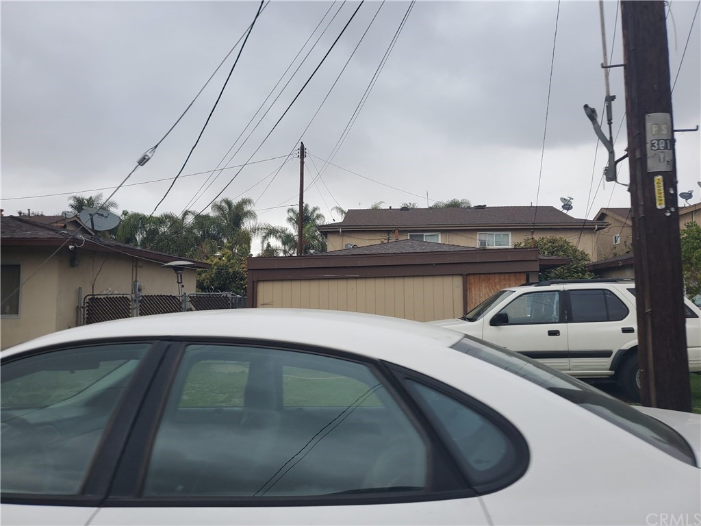 7913 Howe Street Paramount, CA 90723 - Photo 7 of 17 a car parked on the side of the road