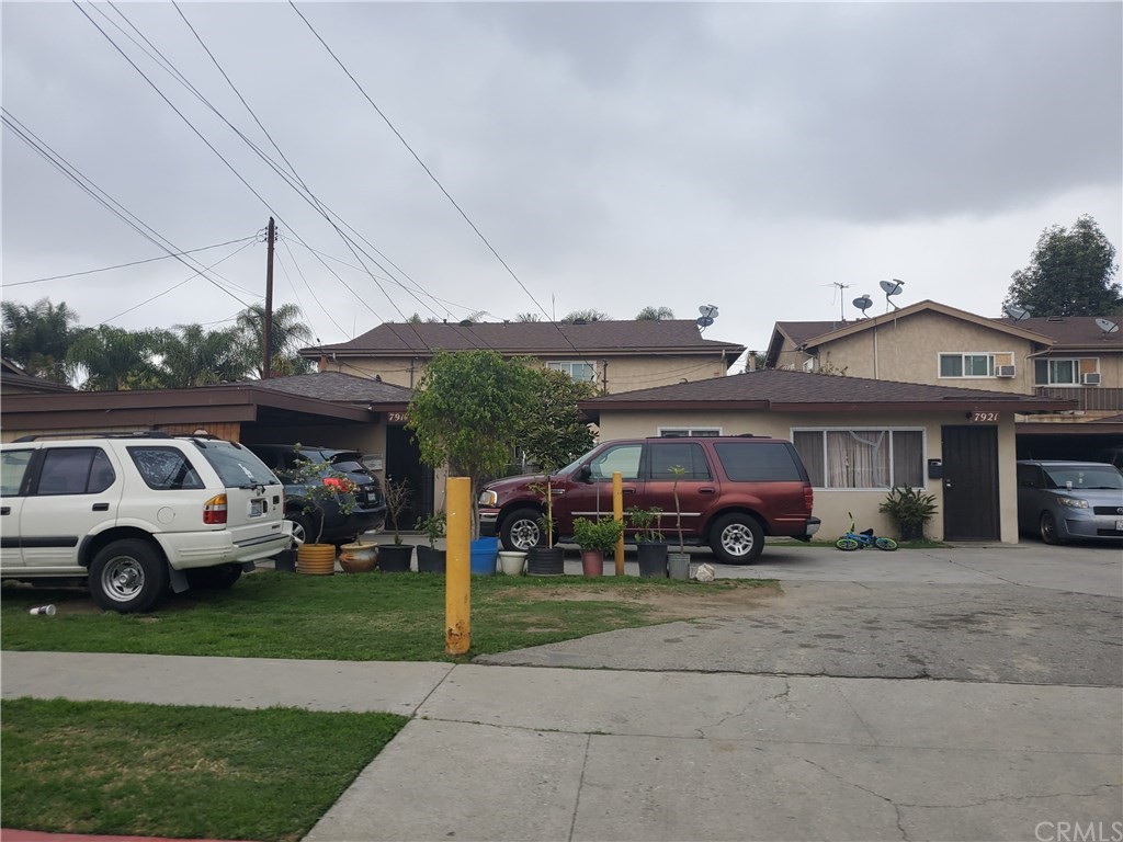 7913 Howe Street Paramount, CA 90723 - Photo 10 of 17 a car parked in front of a house
