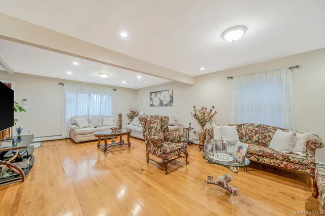 a living room with furniture and a table