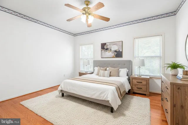 a kitchen with stainless steel appliances granite countertop a refrigerator a sink a stove a microwave and island