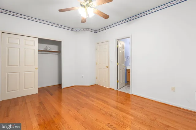 a kitchen with stainless steel appliances granite countertop a sink a stove and refrigerator