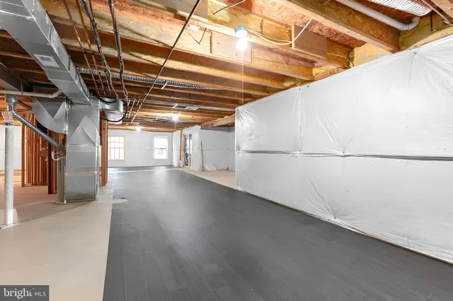 an aerial view of a house with outdoor space