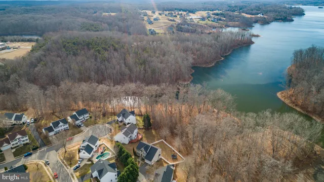 a view of an entryway with wooden floor and a door