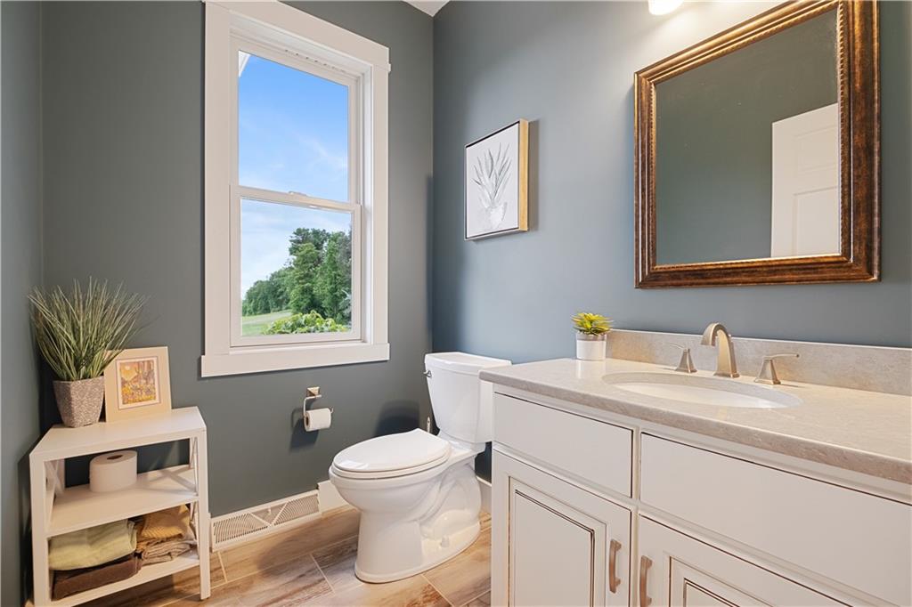 3396 5 Points Road Indiana, PA 15701 - Photo 23 of 49 a bathroom with a toilet sink and mirror
