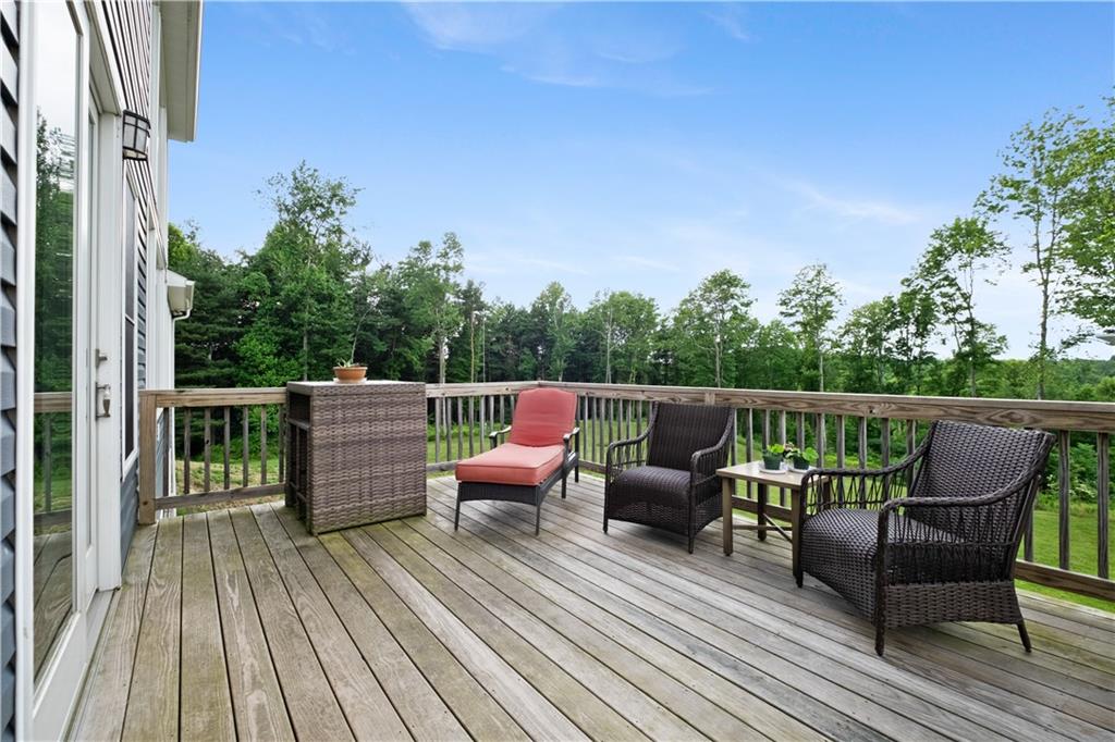 3396 5 Points Road Indiana, PA 15701 - Photo 25 of 49 a wooden deck with furniture and wooden floor