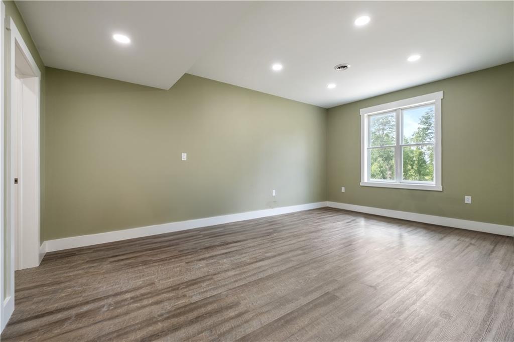 3396 5 Points Road Indiana, PA 15701 - Photo 43 of 49 an empty room with wooden floor and windows