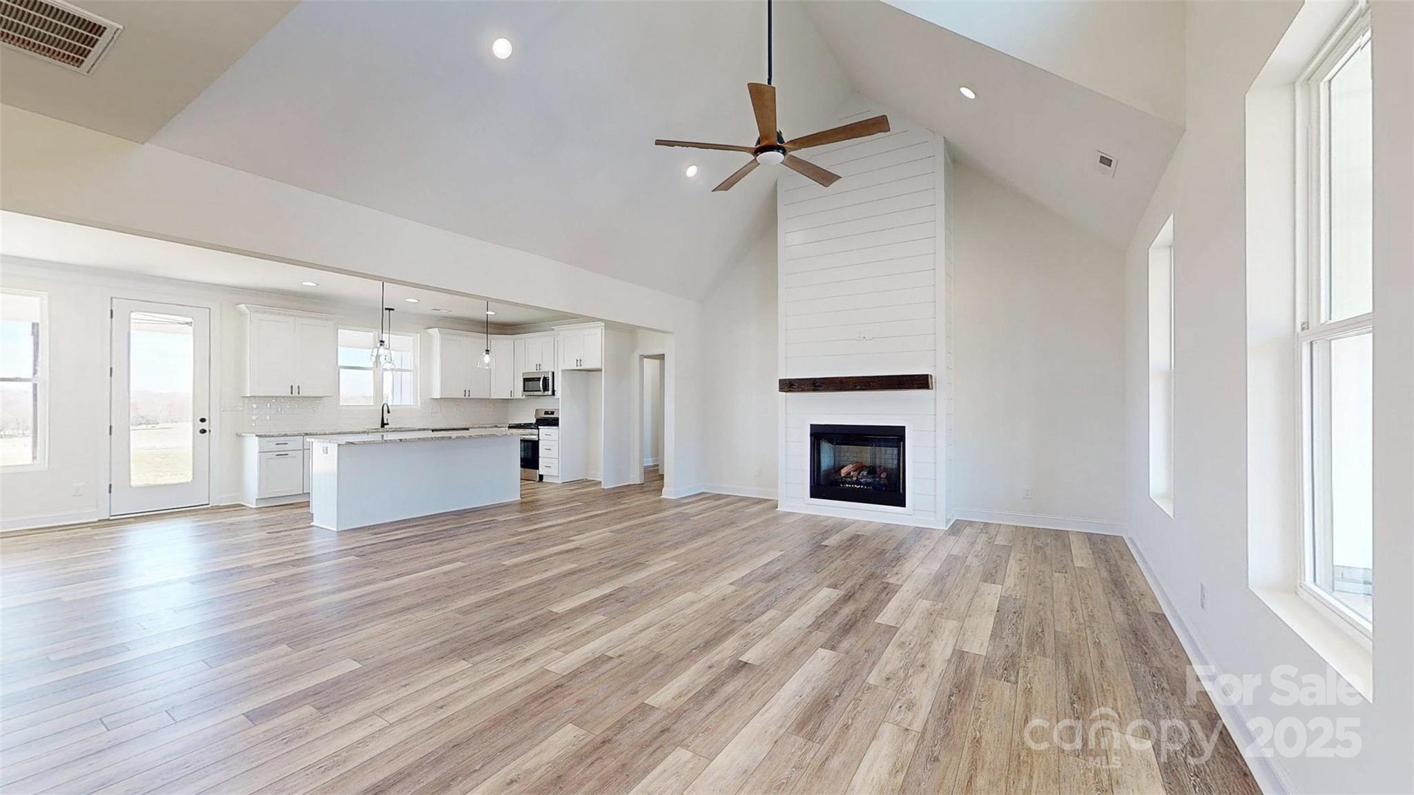 2906 Lathan Road Monroe, NC 28112 - Photo 35 of 41 a view of a kitchen with microwave and cabinets