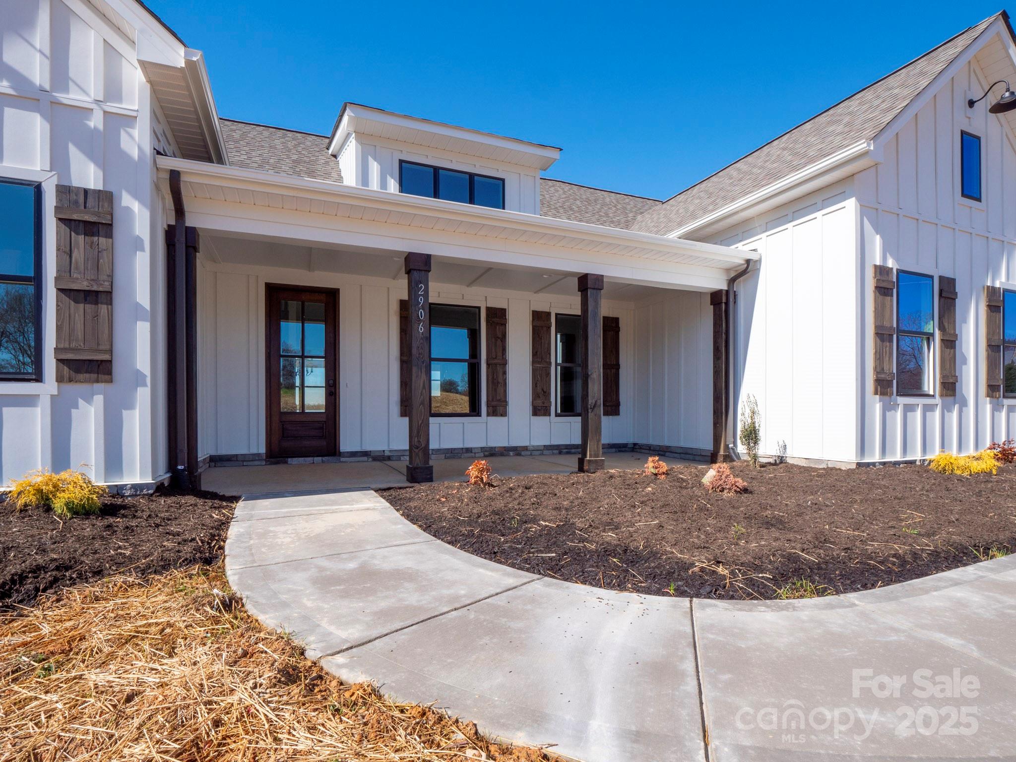 2906 Lathan Road Monroe, NC 28112 - Photo 38 of 41 a view of a house with entrance gate