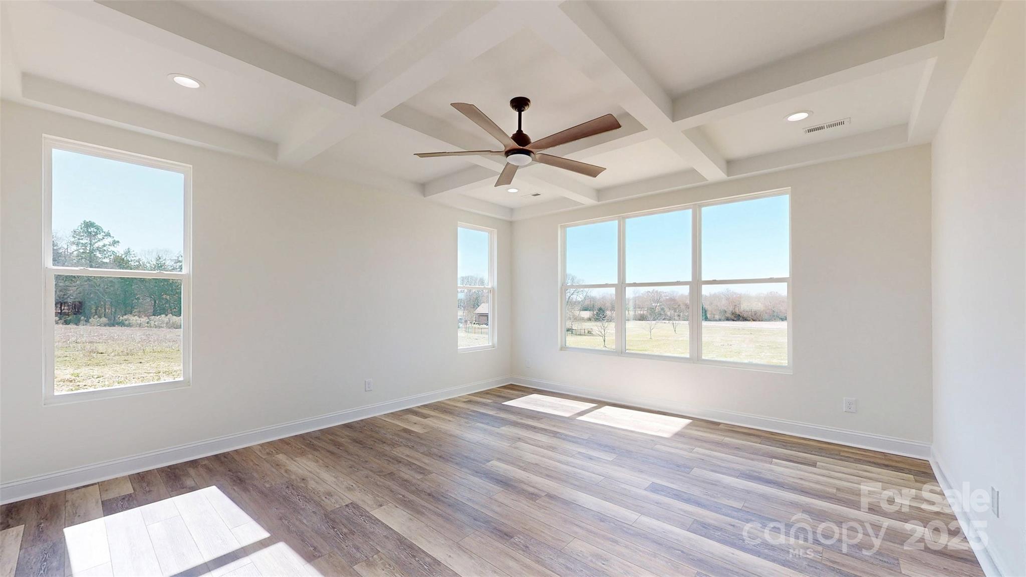 2906 Lathan Road Monroe, NC 28112 - Photo 10 of 41 a view of an empty room with a window