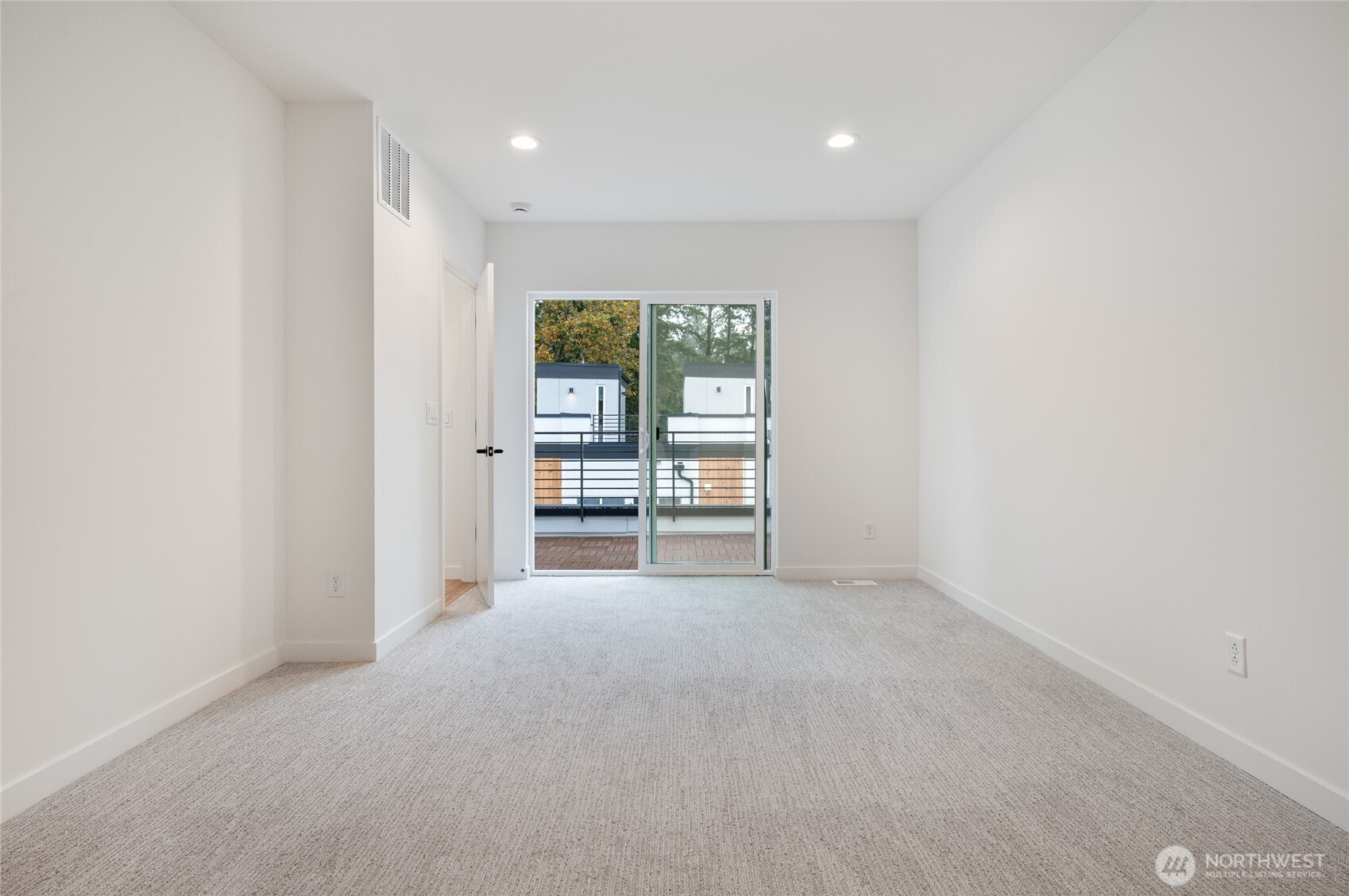 1176 129th Avenue Southeast Bellevue, WA 98005 - Photo 14 of 32 a view of an empty room with a window