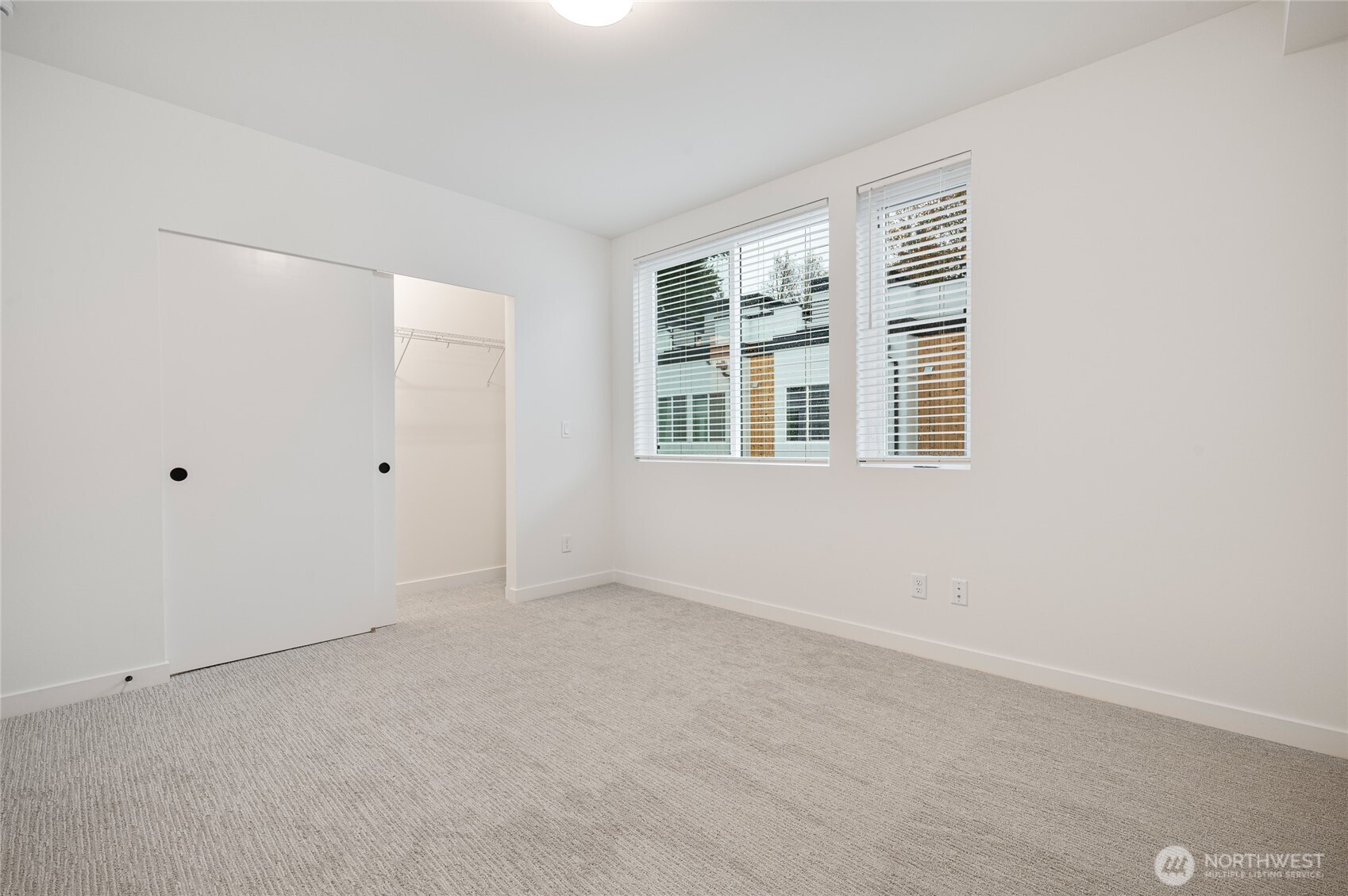 1176 129th Avenue Southeast Bellevue, WA 98005 - Photo 21 of 32 a view of an empty room with a window