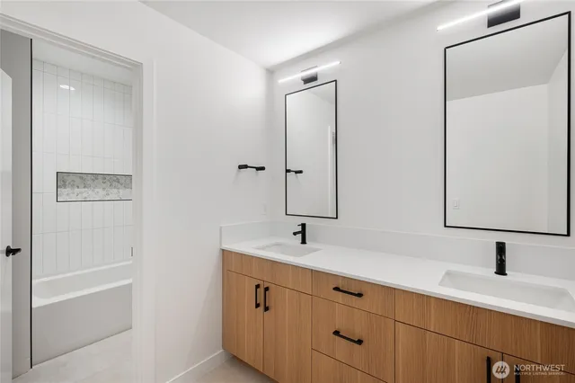 a bathroom with a shower and a bathtub