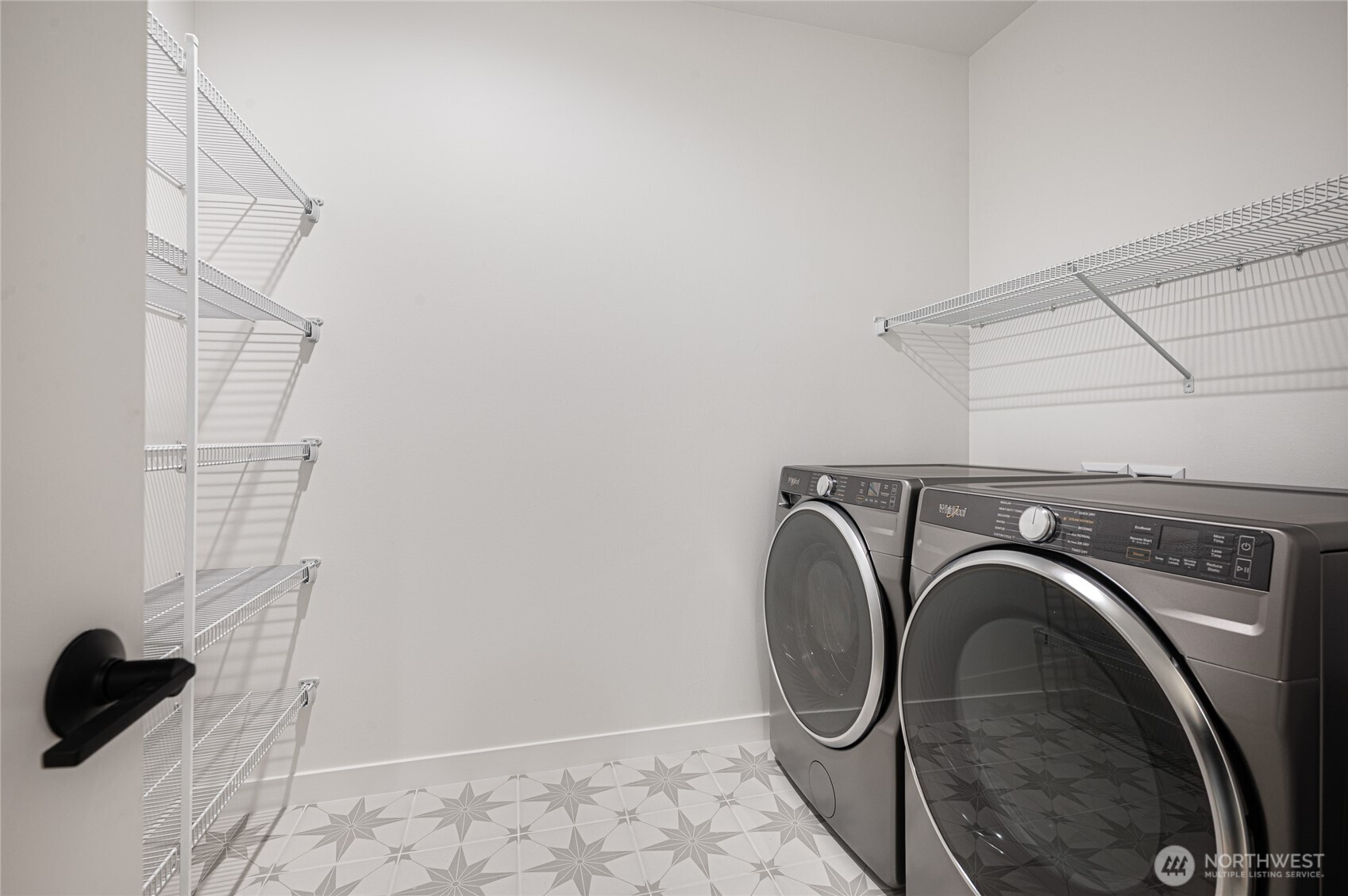 1176 129th Avenue Southeast Bellevue, WA 98005 - Photo 28 of 32 a utility room with dryer and washer